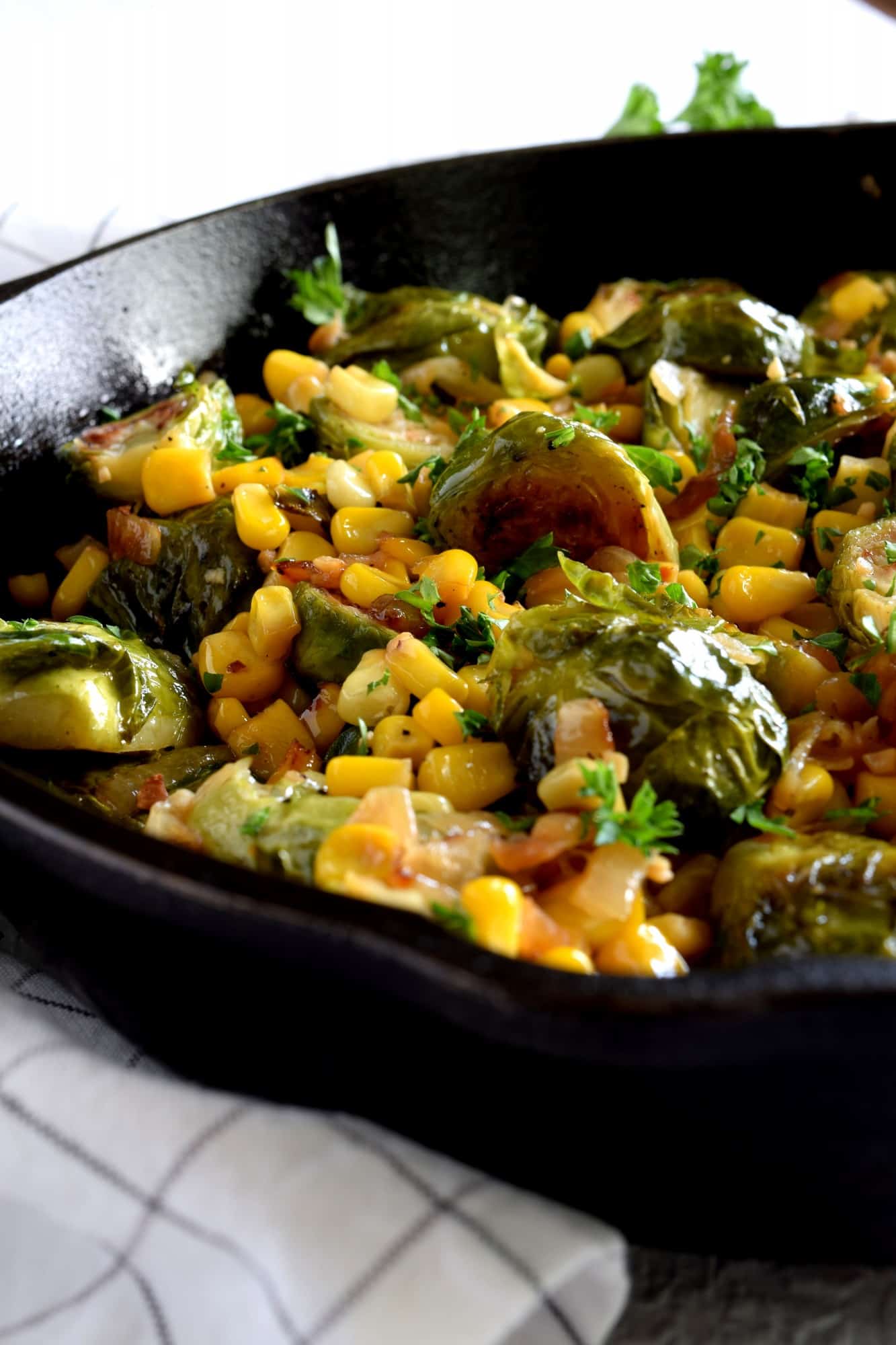 Spicy PanSeared Brussel Sprouts with Corn & Caramelized Onions