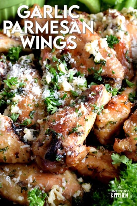 Chicken wings should be easy to prepare and taste great and those two simple rules are applied to these Garlic Parmesan Chicken Wings. With so much flavour, it's hard to believe that they are baked in an oven!  Tossed in a garlicky, cheesy, butter sauce, there never seems to be enough of these to please everyone! #garlic #garlicky #parmesan #cheese #chicken #wings #baked