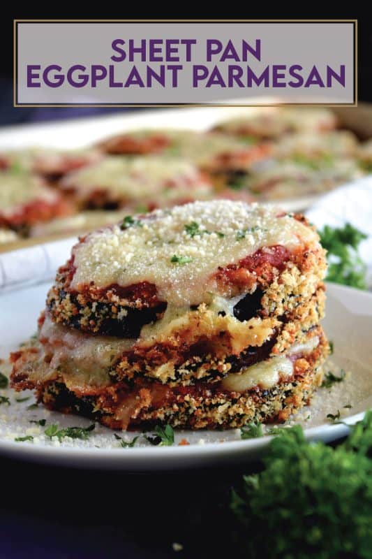 An update on an old Italian classic; this healthier version of Sheet Pan Eggplant Parmesan is bursting with flavour.  No need to pan-fry the eggplant first in this version; it's coated in panko crumbs and baked to keep it crispier and lighter! #eggplant #parmesan #eggplantparmesan #italianrecipes #sheetpan #sheetpanrecipes #eggplant #parmesan #eggplantparmesan #italianrecipes #sheetpan #sheetpanrecipes