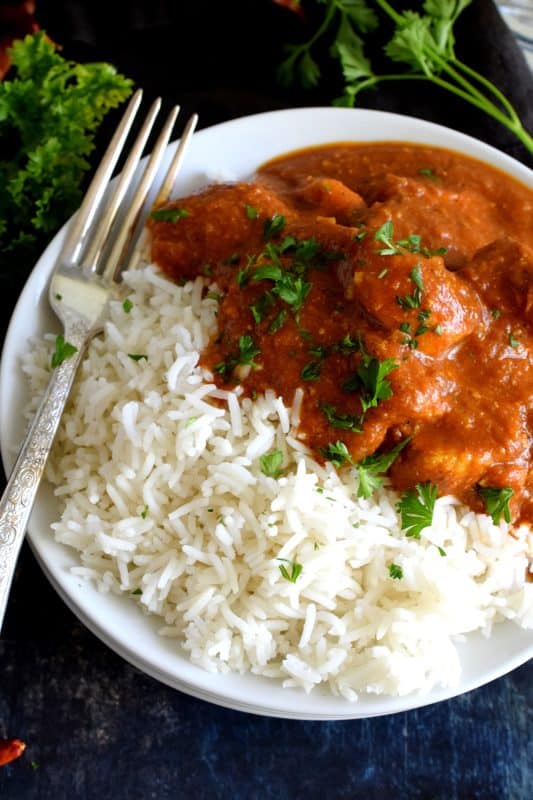 Tender chicken breast pieces, marinated in yogurt and spices, and simmered in a thick, luscious curry sauce. Why go out for Indian food when you can make Chicken Tikka Masala at home? Going out is so last year, anyway! #tikka #masala #tikkamasala #chicken #chickentikka