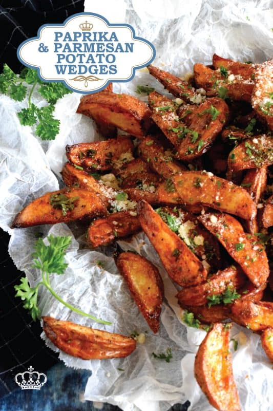 Roasted to perfection and perfectly seasoned, Paprika and Parmesan Potato Wedges are the perfect side dish - smoky, garlicky, onion-y, and cheesy - could these get any better? Oftentimes, these are served with finger foods like pizza or chicken wings. #potato #potatoes #wedges #wedge #fries #roasted #baked #cheese #parmesan