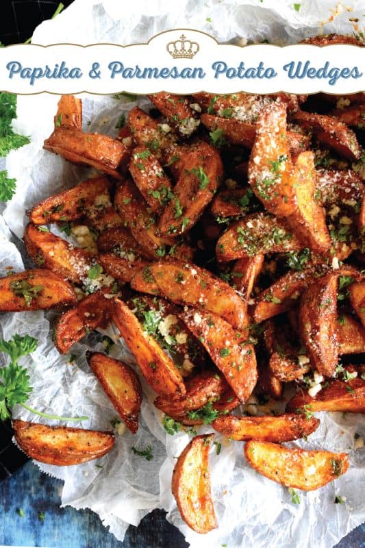 Roasted to perfection and perfectly seasoned, Paprika and Parmesan Potato Wedges are the perfect side dish - smoky, garlicky, onion-y, and cheesy - could these get any better? Oftentimes, these are served with finger foods like pizza or chicken wings. #potato #potatoes #wedges #wedge #fries #roasted #baked #cheese #parmesan