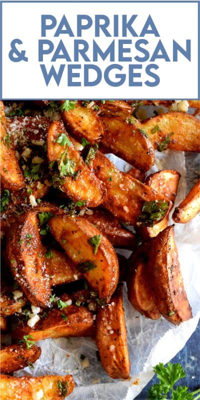 Roasted to perfection and perfectly seasoned, Paprika and Parmesan Potato Wedges are the perfect side dish - smoky, garlicky, onion-y, and cheesy - could these get any better? Oftentimes, these are served with finger foods like pizza or chicken wings. #potato #potatoes #wedges #wedge #fries #roasted #baked #cheese #parmesan