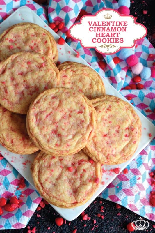 Not all great cookies are soft and chewy. Valentine Cinnamon Heart Cookies are thin and crispy with a soft, sweet center. And, they're packed full of everyone's favourite cinnamon candy! Make a batch for your special someone today! #valentine #cinnamon #heart #candy #cookies