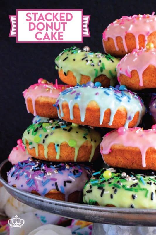 Who doesn't get excited when they see a big pile of donuts? Sure, you could go to your favourite pastry shop, but you can easily make your own donuts at home. This Stacked Donut Cake is proof of that! And, it's perfect for any occasion! #donuts #homemade #stackedcake #donutcake