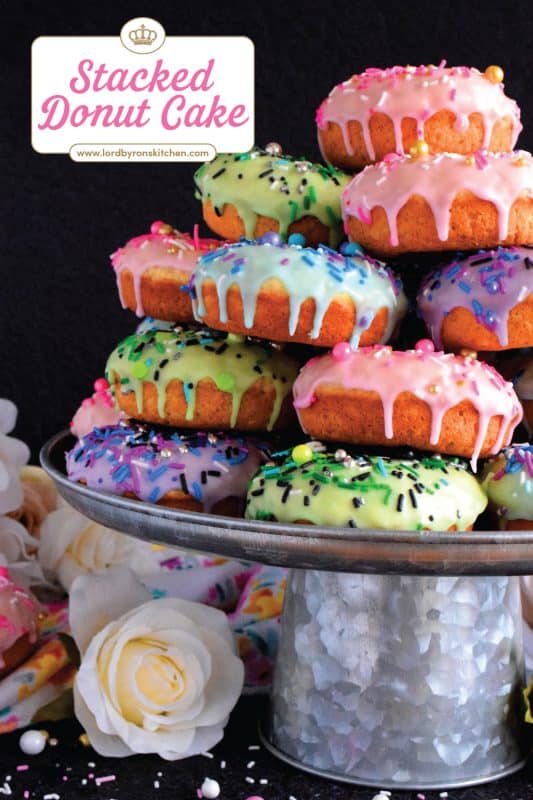 Who doesn't get excited when they see a big pile of donuts? Sure, you could go to your favourite pastry shop, but you can easily make your own donuts at home. This Stacked Donut Cake is proof of that! And, it's perfect for any occasion! #donuts #homemade #stackedcake #donutcake