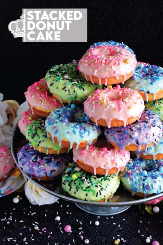 Who doesn't get excited when they see a big pile of donuts? Sure, you could go to your favourite pastry shop, but you can easily make your own donuts at home. This Stacked Donut Cake is proof of that! And, it's perfect for any occasion! #donuts #homemade #stackedcake #donutcake