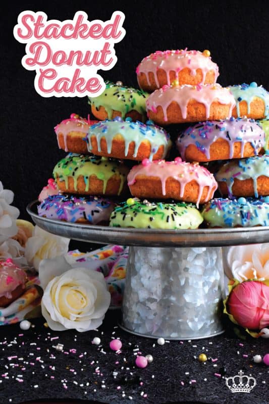 Who doesn't get excited when they see a big pile of donuts? Sure, you could go to your favourite pastry shop, but you can easily make your own donuts at home. This Stacked Donut Cake is proof of that! And, it's perfect for any occasion! #donuts #homemade #stackedcake #donutcake