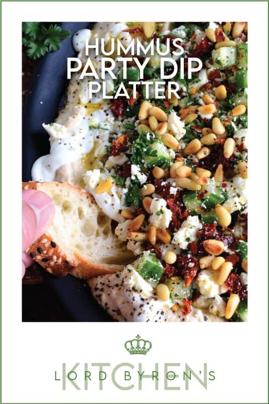What's a party without dip? Hummus Party Dip Platter is a large, layered dip that's just perfect for entertaining a crowd. This all-in-one dip has hummus, sour cream, pine nuts, sun dried tomatoes, cucumbers, feta, and a few other ingredients too! Serve this on any occasion for a delicious, crowd-pleasing appetizer! #hummus #dip #appetizer #party #platter #spread