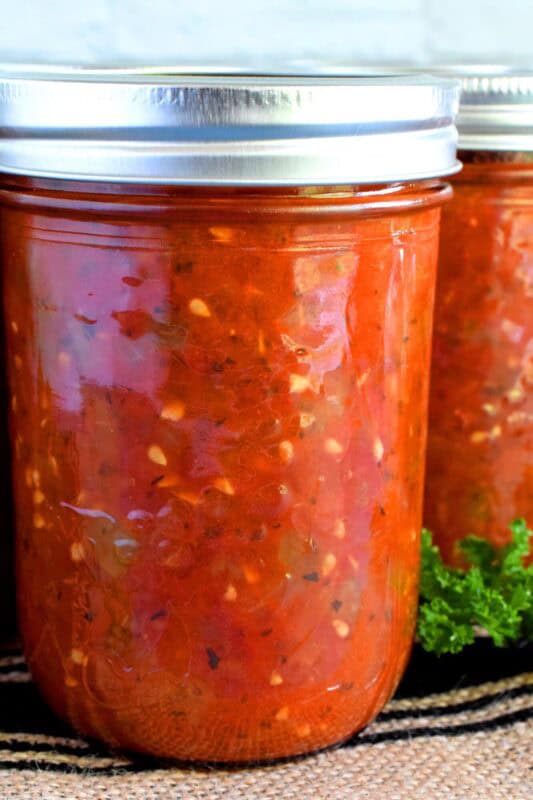 A great base to any pasta sauce, soup or stew; Canned Stewed Tomatoes is an inventive way to jazz up baked chicken or broiled seafood. Each jar is packed with tomatoes, onions, celery, and green bell pepper, making meal prep fast and easy! #canned #preserved #tomatoes #stewed
