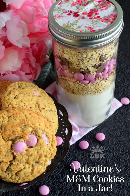 Jars packed with the ingredients needed to prepare a homemade recipe is a great gift idea! Show how much you care with Valentine M&M Cookies in a Jar!#cookies #mason #jar #recipes #valentines