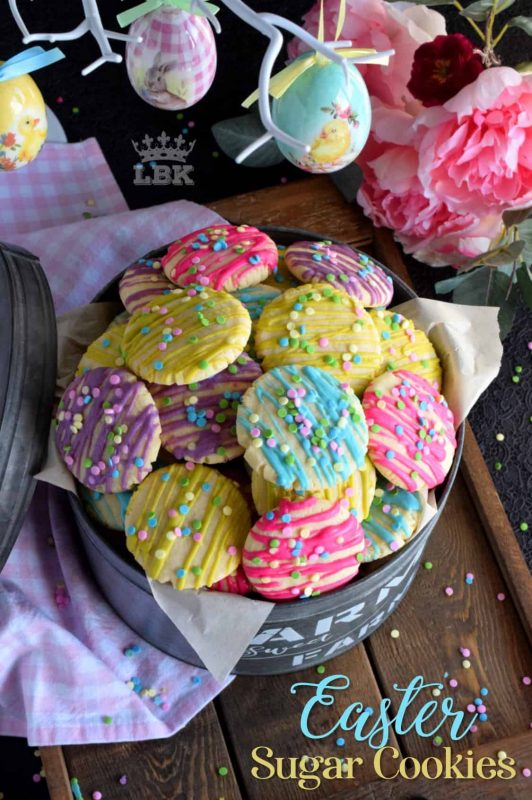Whimsical and playful, Easter Sugar Cookies are a springtime delight! Easy and fun to make, and great for giving as a gift to that favourite teacher or daycare provider!#Easter #cookies #sprinkles #pastel #colours #candy #melts @wilton