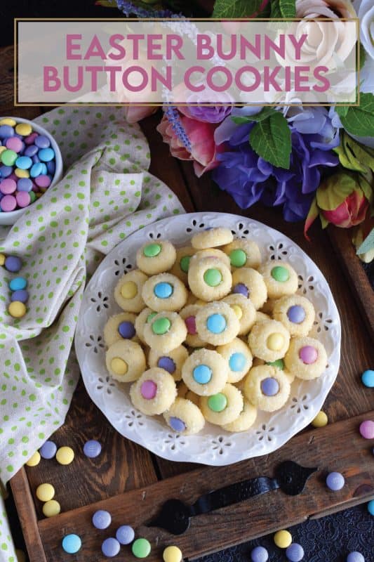 Miniature, one-bite cookies made with pastel candy centers. Easter Bunny Button Cookies are a great Easter gift idea and can be easily packaged for gift-giving, or just save them all for yourself! Whatever you decide, a double batch just might be a good idea! #easter #bunny #cookies #candy #chocolate