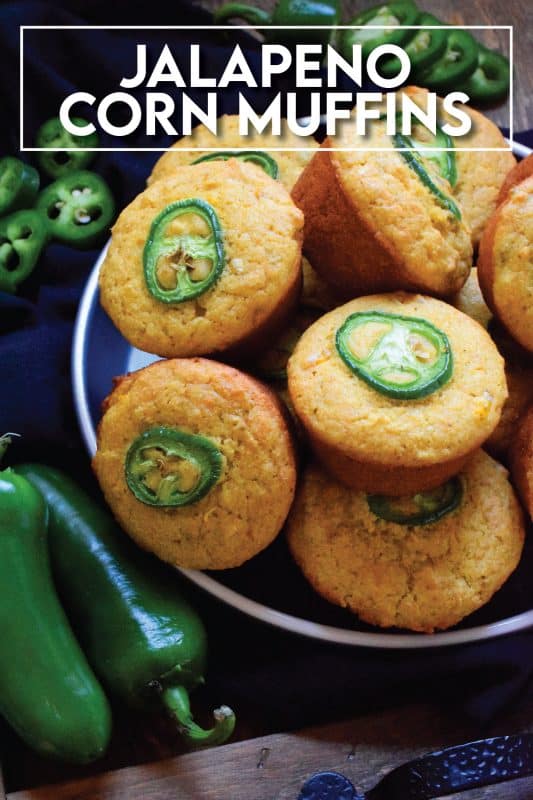 Super light and fluffly, these extremely delicious Jalapeno Corn Muffins are the perfect accompaniment to soups and chilies.  Prepared with whole corn kernals, cornmeal, buttermilk, and butter, what's not to love?  Spicy and savoury, these muffins are absolutely marvelous when served warm with a drizzle of honey! #cornmuffins #jalapeno #cornmeal #cornbread