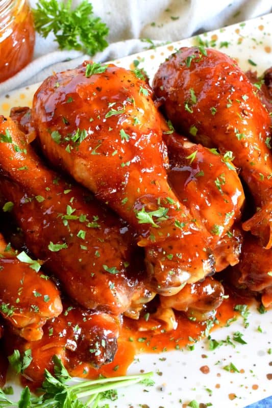 A deliciously easy and budget friendly chicken dish which requires only three ingredients!  Orange Marmalade Barbeque Chicken is about to make your weeknight dinnertime rush so much more relaxed and yummy! #chicken #drumsticks #easy #budget #dinner #weeknight
