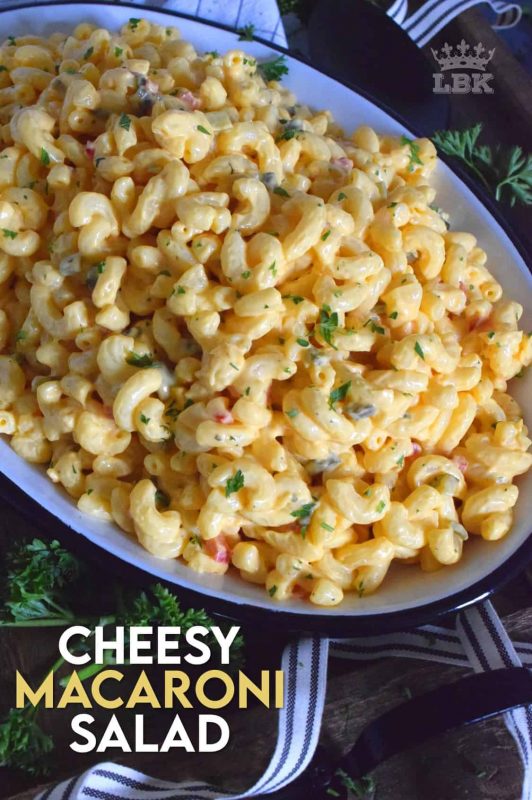 With a few additional ingredients, transform Kraft Dinner or a box of regular Mac & Cheese into a delicious Cheesy Macaroni Salad.  This salad is sure to be a very popular side dish at your dinner table!#kraft #dinner #mac&cheese #macaroni #salad #cheesy