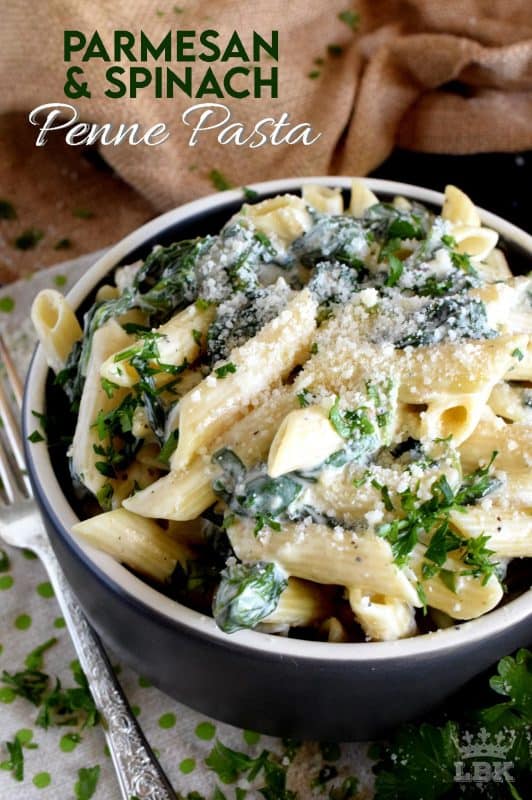 Parmesan and Spinach Penne Pasta is the ultimate creamy pasta lovers dream!  Loaded with parmesan and heavy cream, this pasta is a delightful, non-apologetic dish that provides so much comfort food happiness!#pasta #parmesan #spinach #penne #creamy #meatless