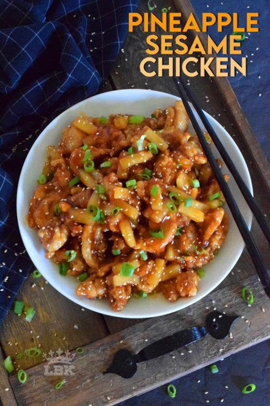 Pineapple Sesame Chicken is a little sweet and a little sour.  It's prepared with boneless, skinless chicken thighs, pineapples and pineapple juice.  Finished with toasted sesame seeds and green onions, this dish is completely delicious! #pineapple #chicken #chinese #asian #cooking #homemade #takeout