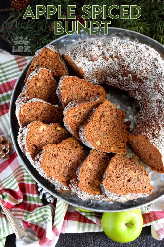 Chopped apples and pecans, combined with holiday spices, make this bundt cake a perfectly rich and moist Christmastime dessert! #bundt #bundtbakers #cake #apple #spiced #christmas #holiday