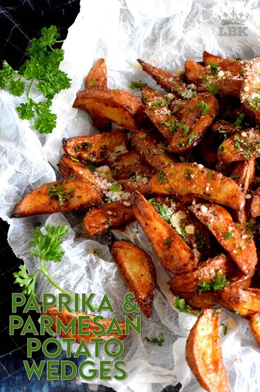 Roasted to perfection and perfectly seasoned, Paprika and Parmesan Potato Wedges are the perfect side dish - smoky, garlicky, onion-y, and cheesy - could these get any better? #potato #wedges #baked #roasted #paprika #parmesan