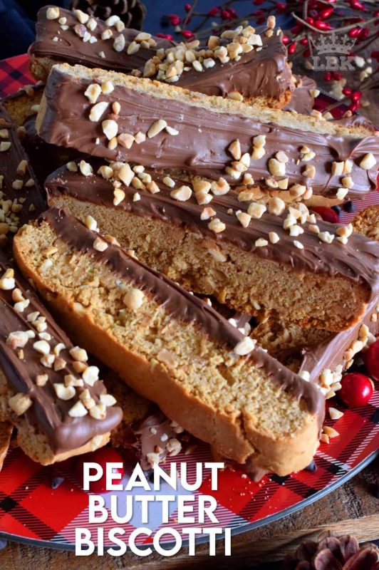 A delicious crisp confection that tastes just as good as it looks! Peanut Butter Biscotti is loaded with peanut butter flavour and paired with melted milk chocolate! #peanutbutter #biscotti #cookies #chocolate #christmas #baking #holiday
