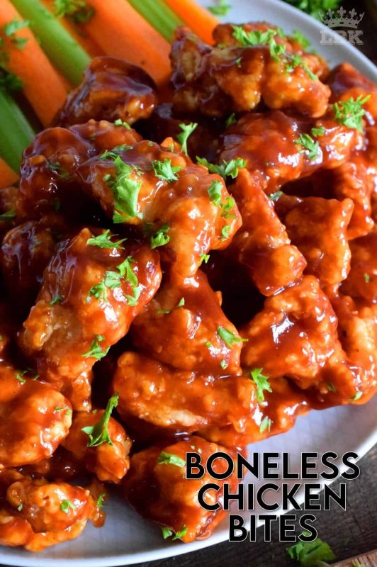 Crispy, fried, battered chicken tossed in your favourite prepared barbecue sauce, Boneless Chicken Bites are a perfect party food.  Serve with fresh veggies, dip, and lots of toothpicks.  There's no need to get your fingers dirty here! #bonelesschicken #barbecuechicken #BBQ #weeknightrecipes