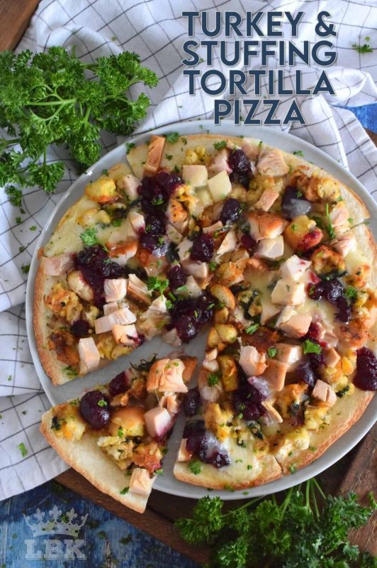 Quick and easy, and a great option for using up holiday leftovers! Turkey and Stuffing Tortilla Pizza has all of the holiday flavours your love on a cheesy, crispy, oven-baked tortilla. Doesn't that sound delicious? #tortilla #pizza #turkey #leftover