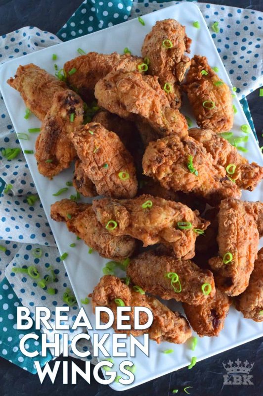 Forget those Breaded Chicken Wings in the frozen section of your local grocery store!  This homemade version has better flavour, more crunch, and most certainly way more bang for your buck.  These are great just the way they are, or toss them in your favourite wing sauce! #chickenwings #breadedchicken #crispychicken #friedchicken #chickenwings