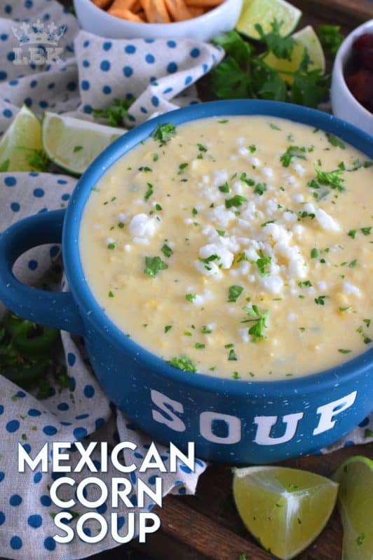 Prepared with sour cream and cream cheese, Mexican Corn Soup is warm and cozy, creamy and cheesy, and has a little bit of heat and zing. Serve with crumbled bacon, tortilla chips, and lime wedges. #mexican #cornsoup #mexicansoup #creamy #cheesy #soup
