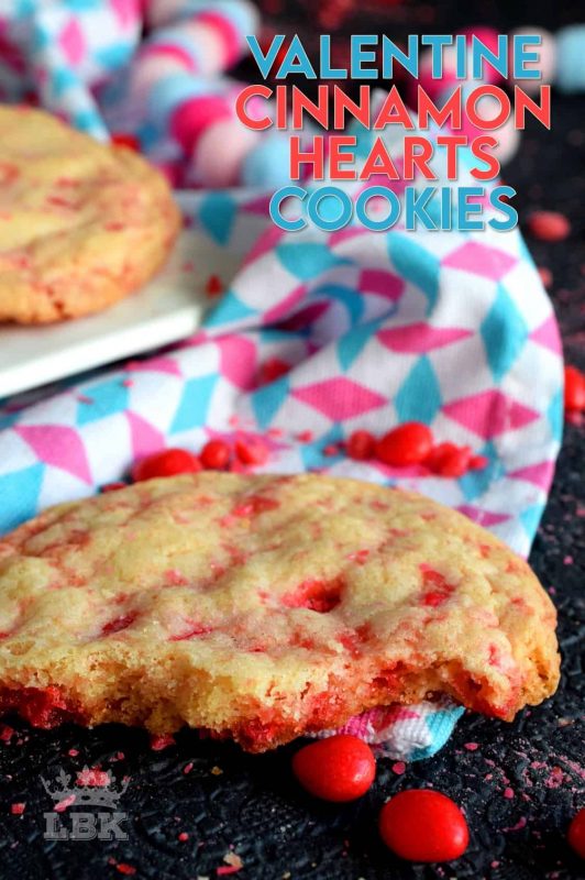 Not all great cookies are soft and chewy.  Valentine Cinnamon Heart Cookies are thin and crispy with a soft, sweet center.  And, they're packed full of everyone's favourite cinnamon candy! #valentinecookies #valentinebaking #valentinetreats #cinnamonhearts #cinnamoncookies