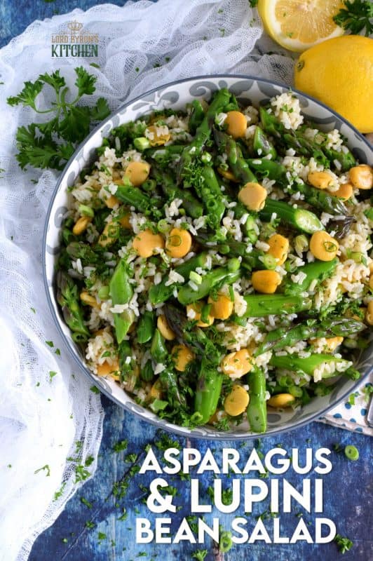A delicious side salad, yet hearty enough to be a complete meal. Made with asparagus and canned lupini beans, this dish is great served cold or at room temperature! #asparagus #lupini #bean #rice #salad #summer #picnic #backyard