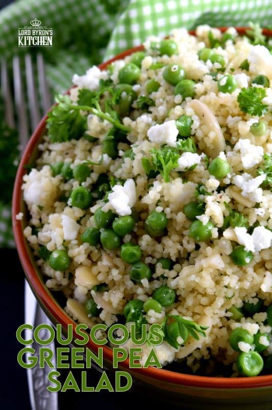 Delightful and flavourful, Couscous Green Pea Salad is prepared with almonds and feta, and gently tossed with a tangy and spicy vinaigrette. Serve this salad cold or at room temperature. It's fresh and delicious; a wholesome meal couldn't possibly get any better than this! #couscous #greenpea #salad #couscousrecipes