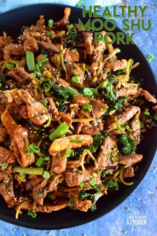 Thinly sliced pork loin chops, stir fried with egg, cabbage, and kale, and tossed in a thick, savoury sauce; Healthy Moo Shu Pork is not only delicious, but is also budget and family friendly! #mooshu #mooshupork #pork #porkchops #asianrecipes #stirfry