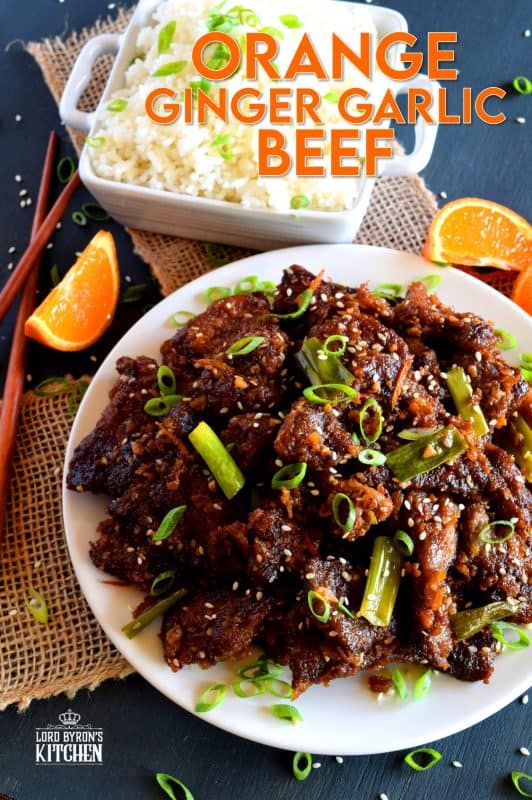 Orange Ginger Garlic Beef is a quick take-out inspired dish which packs a punch of flavour while using just a few fresh ingredients. The cooked beef is tossed in a thick, sweet sauce made with molasses and orange zest. It's absolutely delicious! #orange #beef #crispy #fried #sauce #ginger #garlic