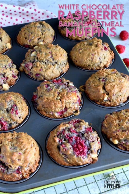 In our home, muffins are considered one of the major food groups, especially if that muffin happens to be these White Chocolate Raspberry Banana Oatmeal Muffins!  These disappear before they've had time to cool down! #raspberries #banana #muffins #oatmeal #chocolate