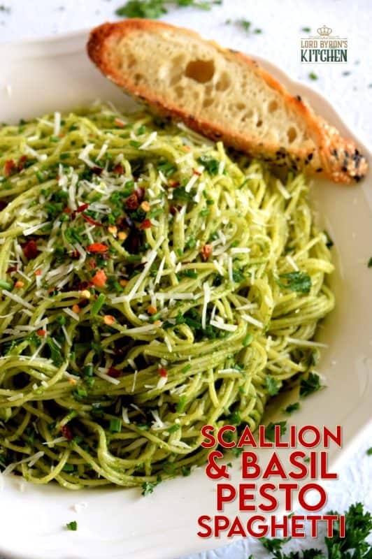 Crisp, summery, onion flavour with fresh basil and lemon undertones - Scallion and Basil Pesto Spaghetti is bound to be your new favourite pasta!  Simple ingredients, quick and easy to prepare, this pesto fits into any dietary preference and is bursting with flavour! #pesto #scallion #basil #sauce #pastasauce #pestopasta #greenonions
