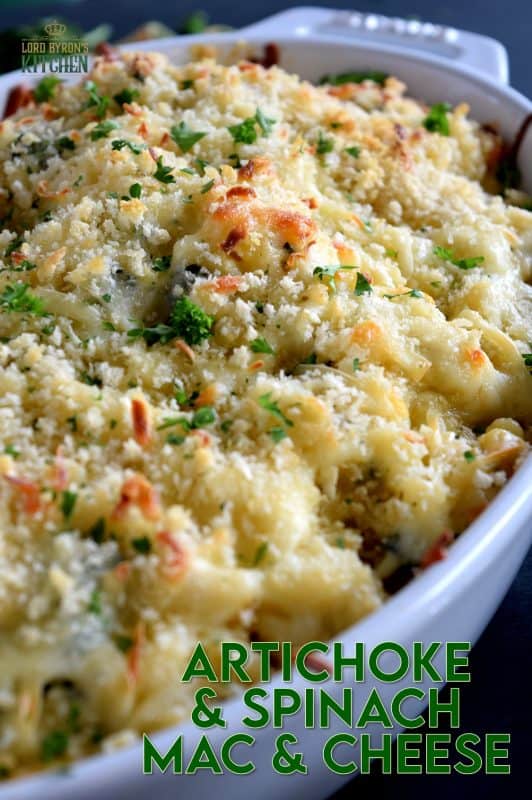 There's nothing wrong with regular mac and cheese, but it simply cannot compare to this Ultimate Spinach and Artichoke Mac and Cheese!  It is the cheesiest and the creamiest, with a crispy, crunchy crumb topping. Make no mistake, this cannot be found in a box at the grocer! #macandcheese #artichoke #spinach #ultimate #pasta #spinachandartichoke