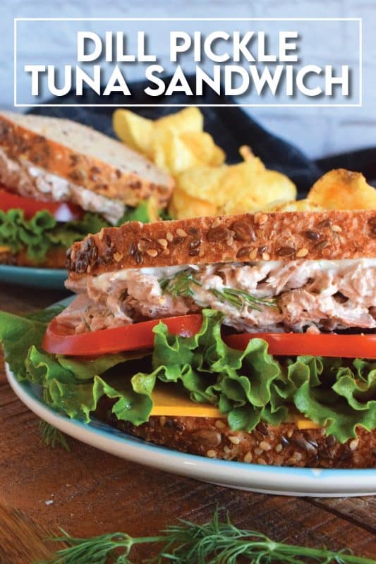 Who has time for boring sandwiches? You won't find that here, and this Dill Pickle Tuna Salad Sandwich is making sure of it! The tuna is prepared with dill pickles and fresh dill for maximum dill flavour. Finish it off with a slice of cheese, crisp lettuce, and sliced tomatoes all on great-tasting, multi-grain bread! #sandwich #dillpickle #dill #tuna #tunasandwich #tunasalad