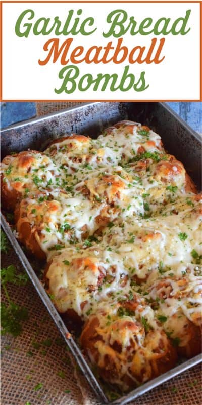 Garlic Bread Meatball Bombs are hollowed out dinner rolls which have been liberally smeared with homemade garlic butter. Each roll is stuffed with a meatball and sauce, then topped with cheese. Baked to a bubbling, gooey perfection, these bombs are the bomb! #meatballs #sliders #dinnerrollrecipes #bombs #meatballrecipes #familyrecipes #garlicbread