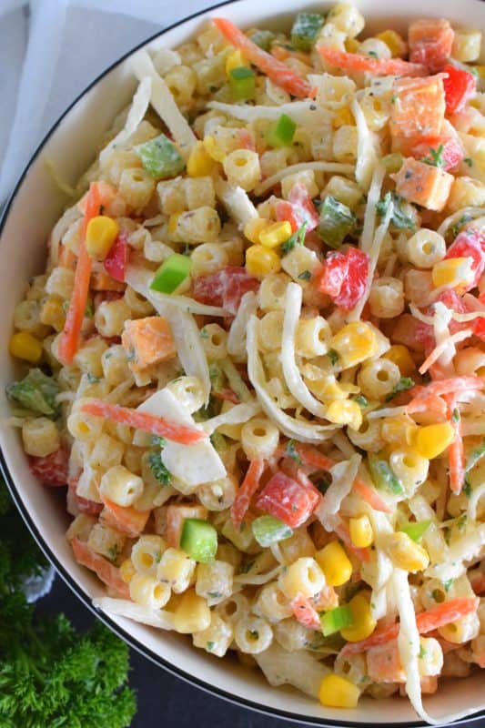 For those times when you're not sure if you want a coleslaw or a pasta salad, make them both - together! All of the tanginess and sweetness that you love in a crunchy coleslaw, coupled with the savoury, homestyle taste of a classic pasta salad! Why have just the one when you can have both? #coleslaw #pastasalad #salad #pasta #summer #side #picnic