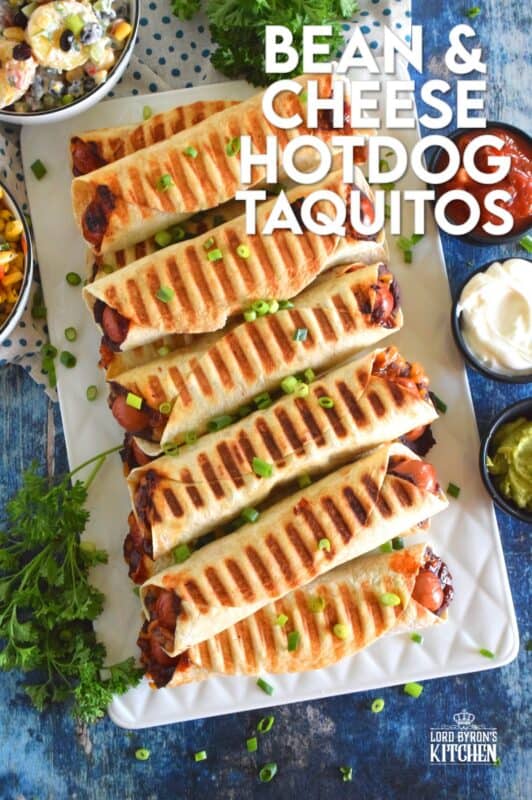 If you cannot decide whether you want a hot dog, a burrito, or a taquito for dinner, then you should just have all three in one! Bean and Cheese Hotdog Taquitos are prepared by rolling a tortilla with refried black beans, shredded cheese, and a hotdog. Grill until golden and crispy. Serve with your favourite dippers! #bbq #bean #cheese #hotdog #taquitos