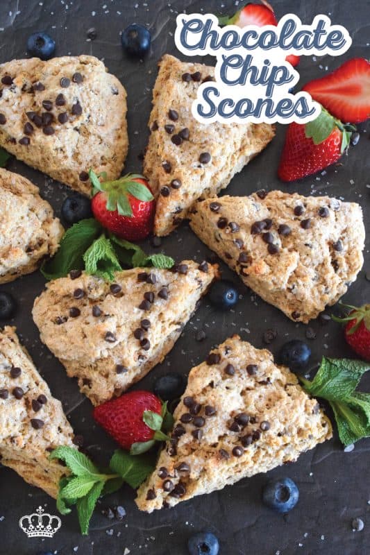 A scone for both the little kids in your life, and the adults that live their lives like a kid, Chocolate Chip Scones are sweeter than regular scones. With a good splash of vanilla, loads of milk chocolate chips, and a sprinkling of coarse sugar on top, these scones are an absolute treat. #scones #chocolate #chocolatechips