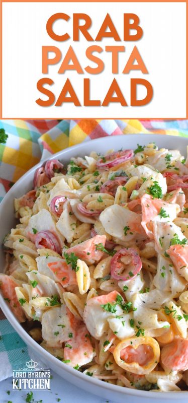Flaked crab is paired with pasta and peppers in this Crab Pasta Salad. It is tossed in a creamy and tangy dressing made with mayonnaise, old bay seasoning, celery salt, and more. A great make-ahead salad best served slightly chilled with your favourite grilled beef! It's surf and turf - summer style! #pastasalad #salad #pasta #seafood #crab #imitationcrab