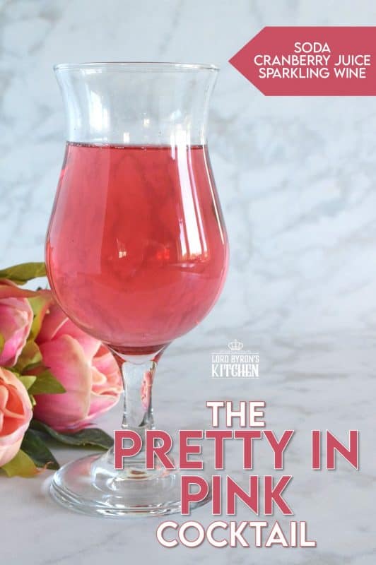 This gorgeous Pretty in Pink Cocktail is prepared with wine, cranberry juice, and soda instead of liqueurs or spirits. With its beautiful shade of pink, consider sharing this cocktail with your valentine! It's also a great option for a bridal shower or a girls night! #prettyinpink #pink #cocktails #summerdrinks #pinkdrinks