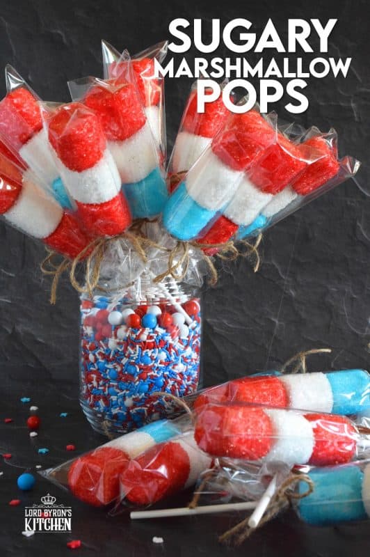 Young kids and old kids alike will love these Sugary Marshmallow Pops! They're easy to prepare and a lot of fun too. It's like making a craft that you can eat when your finished working on it. Crafting and eating - the best of both worlds combined! #marshmallows #marshmallowpops #sprinkles #4thofjuly #canadaday