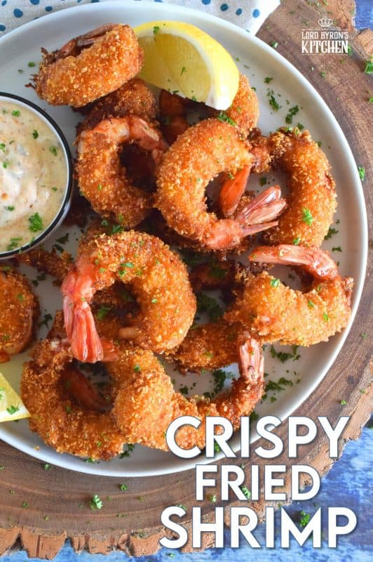 Looking for crunch factor? Look no further! Crispy Fried Shrimp have perfectly cooked succulent shrimp on the inside and a big-bite worthy crunch on the outside. This is most definitely a repeat recipe! #shrimp #friedseafood #friedshrimp #battered #crispy #seafood