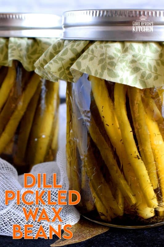 Dill Pickled Wax Beans are super dilly with a hint of salty and peppery flavour. Stock your pantry full of these for a great side dish ready to go at any time. These are perfect on a cheese board or wrapped with thinly sliced hot salami!  #pickled #preserved #canning #waxbeans #dillpickle