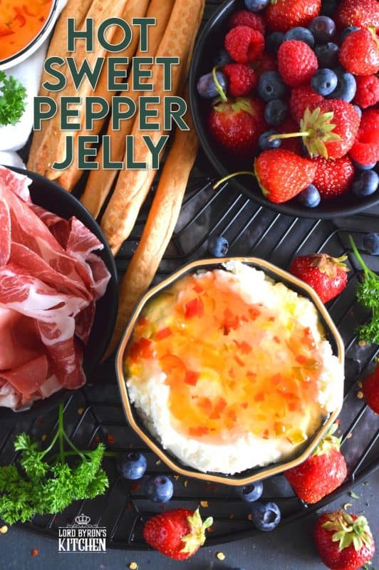 Possibly considered to be more of an appetizer or a dip, Hot Sweet Pepper Jelly is easy to prepare and makes for a quick and easy appetizer or ingredient. These are canned using the water bath canning method, which couldn't be easier! This post will walk you through every step. #hotpepperjelly #hotandsweet #sweetpeppers #canning #preserves #jelly #cannedjelly