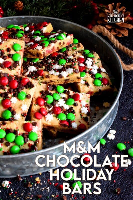 Fast, simple, and easy – just the way Christmas baking should be!  Sheet Pan M&M Chocolate Holiday Bars are festive, fun, and family-friendly! Baking cookies in a sheet pan like this, is much faster than baking one tray at a time! #christmas #holiday #baking #cookies #candy #m&m #sheetpan