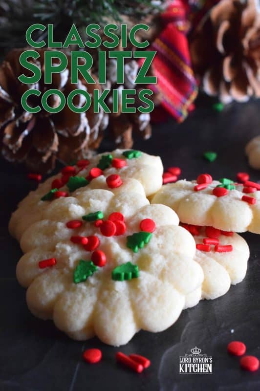 Simple and rustic is the way to go with these super buttery and tender Classic Spritz Cookies. A melt in your mouth cookie with festive sprinkles for fun and folly! These are the quintessential Christmas cookie!! #classic #spritz #cookies #christmas #holiday #baking #spritzer #press #sprinkles